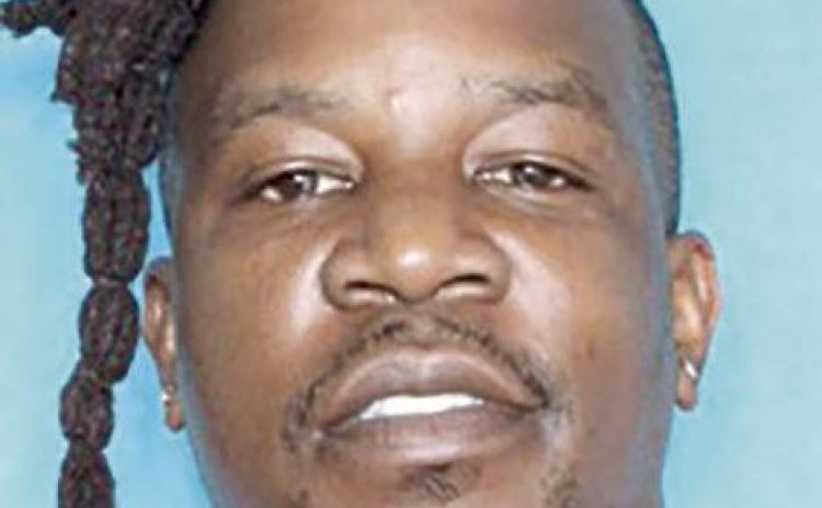 Police seek domestic violence suspect