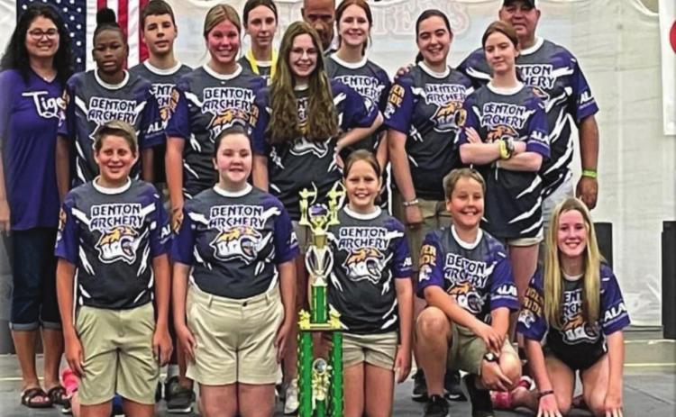Benton Middle School Archery Team with trophy.