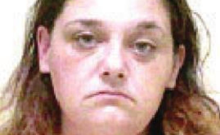 Woman steals TV, fridge from apartment