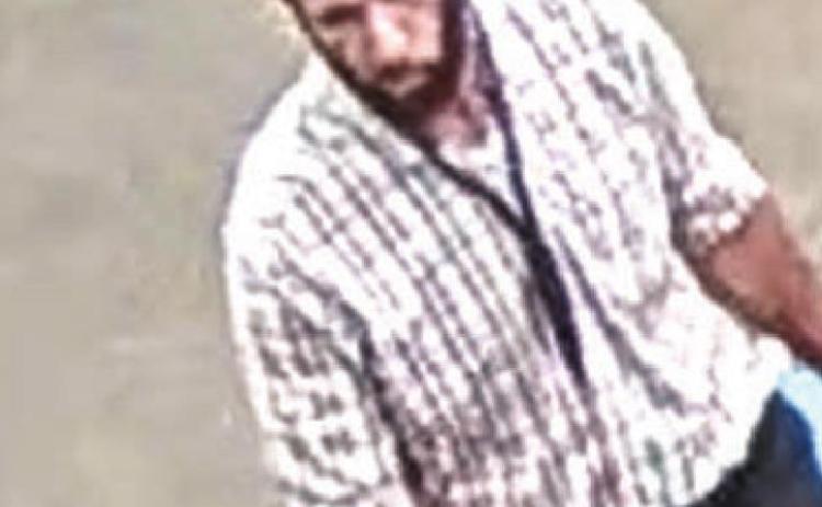 Police seek identities of two theft suspects