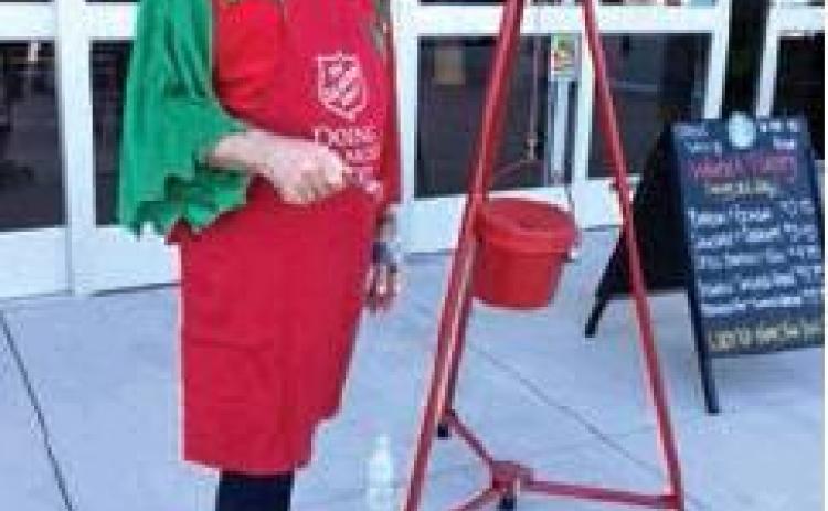 Having fun ringing the Salvation Army bell