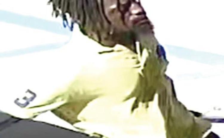 Man wanted for theft from bank