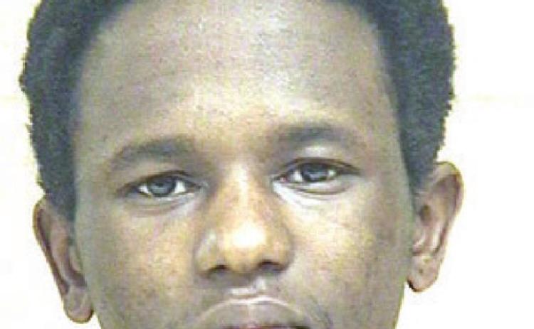 One arrested, another sought in homicide