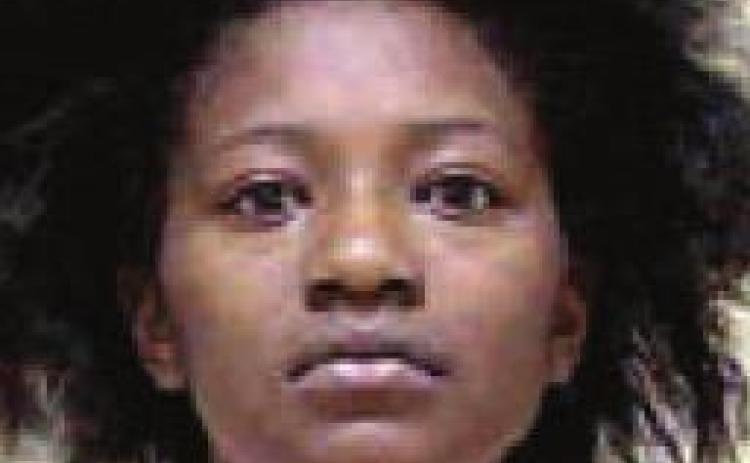 Drugs, handgun found in vehicle with children