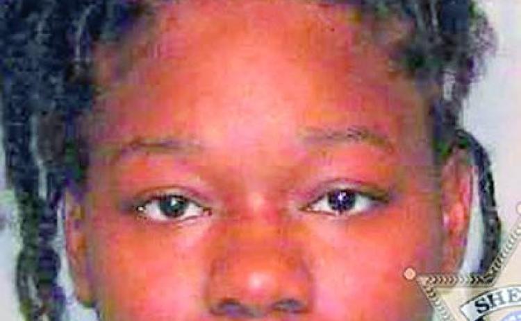 Woman strikes man with car in dispute