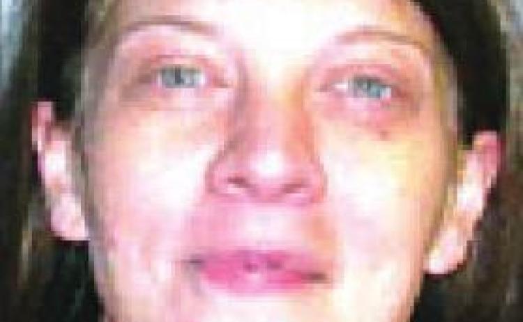 Woman arrested for identity theft