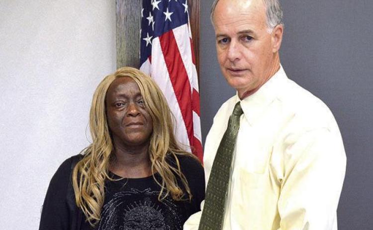 Bossier sheriff presents check to mother of homicide victim