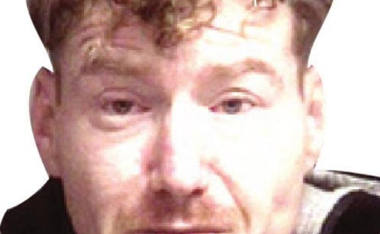 Man charged with battery, resisting