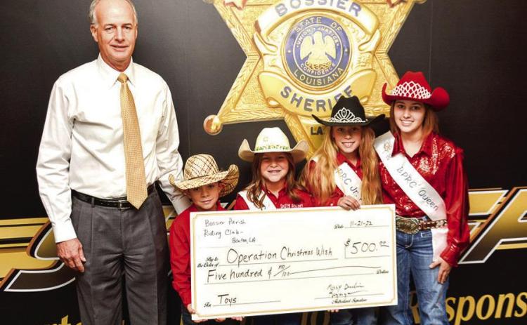 Riding club donates to toy drive