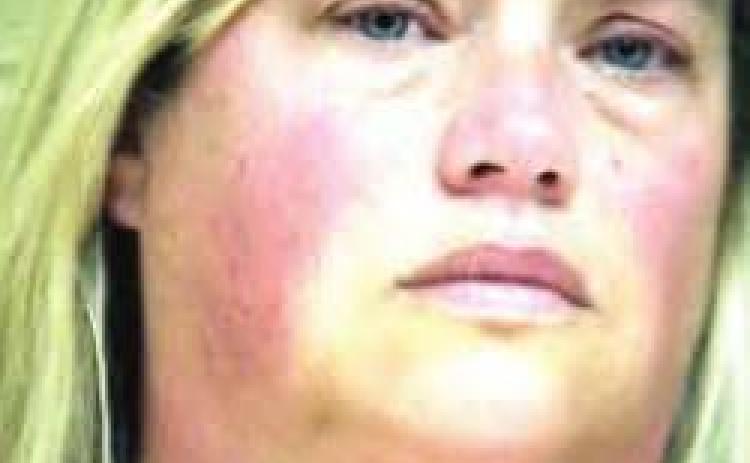 Woman who left child in car says she didn't know it was illegal
