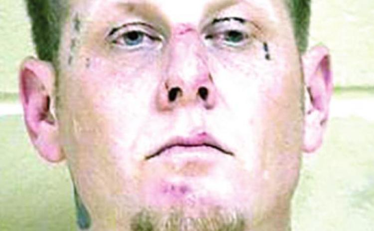 Allegations of robbing, shooting another male leads to arrest