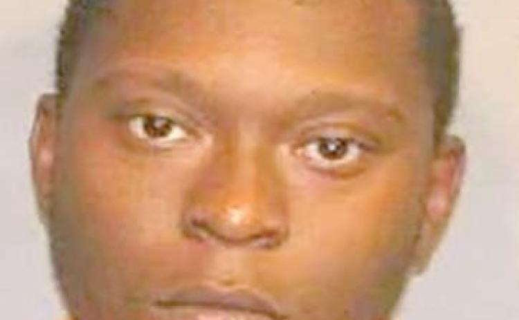 Man guilty of weapons charge on the run