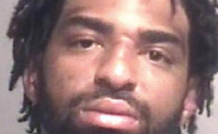 Suspect in two deaths arrested