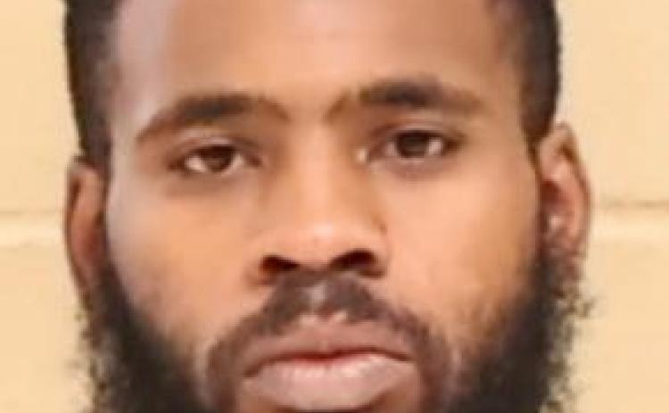 Man Arrested for Threatening Individuals with a Firearm