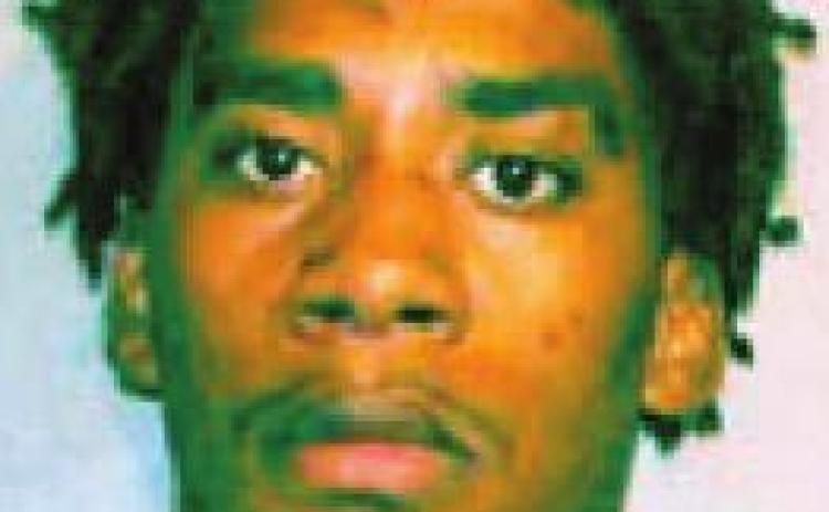 Man arrested after shooting at Popeye’s