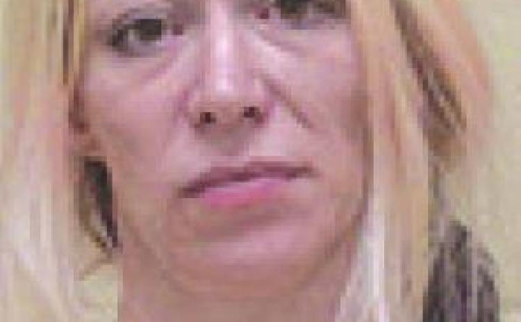 Woman charged with 14 counts of monetary instrument abuse