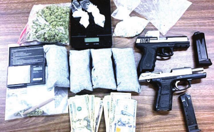 Search warrant yields drugs, firearms after investigation