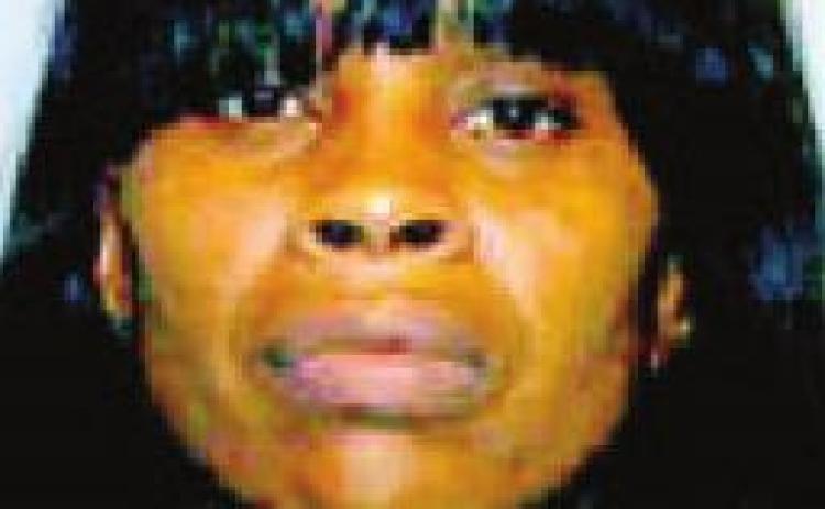 Woman cuts victim on arm after he strikes her with vehicle