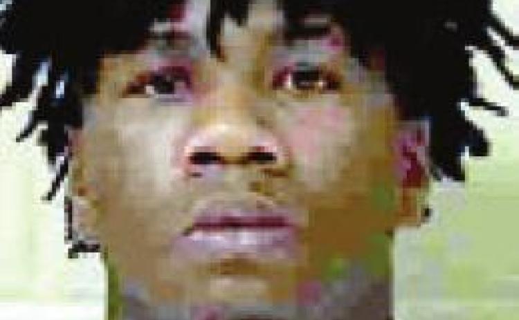 Armed robbery suspect sought