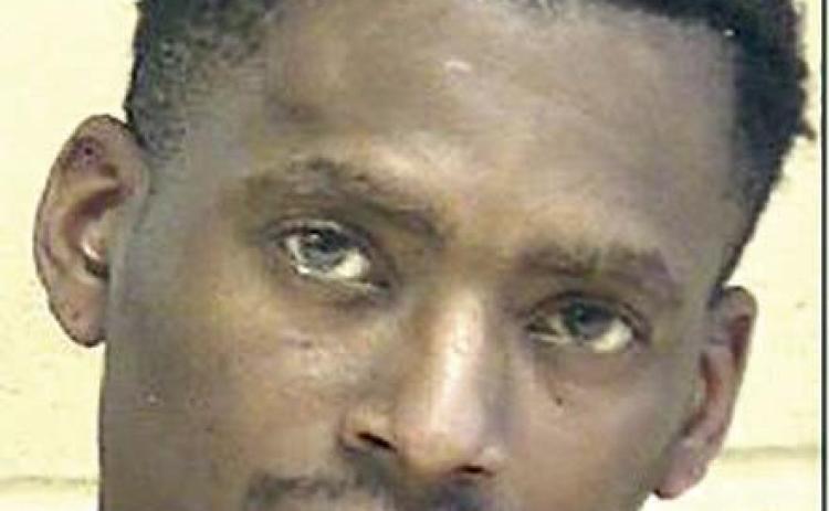 Police arrest felon with firearm