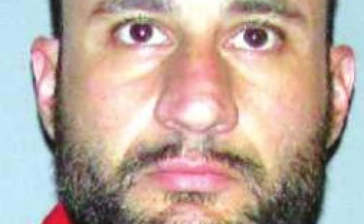 Man charged with home invasion