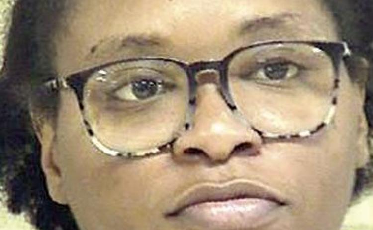 Woman arrested for domestic incident involving a firearm