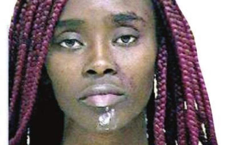 Woman arrested after stealing police car