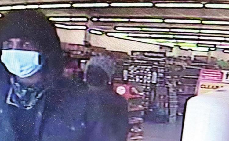 Police seek identities of robbery suspects