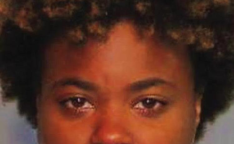SPD arrests woman after video shows her in car attempting to hit victim holding baby!