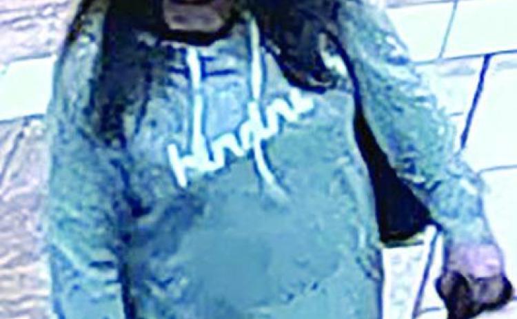Woman who stole property from hotel victim sought