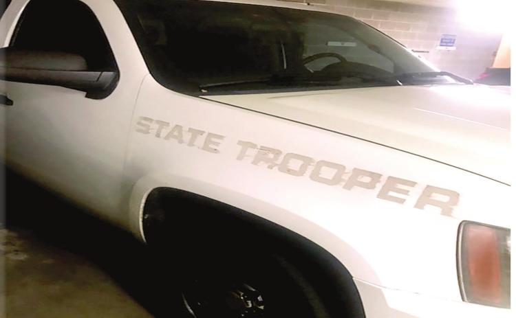Is it legal for Caddo Commissioner Jackson to drive with no tags?