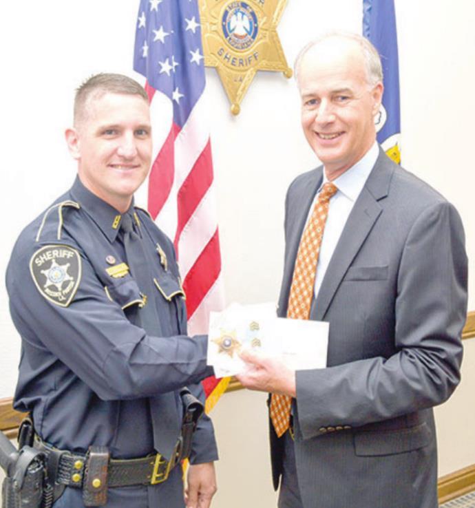 Sgt. John Carroll with Sheriff Julian Whittington