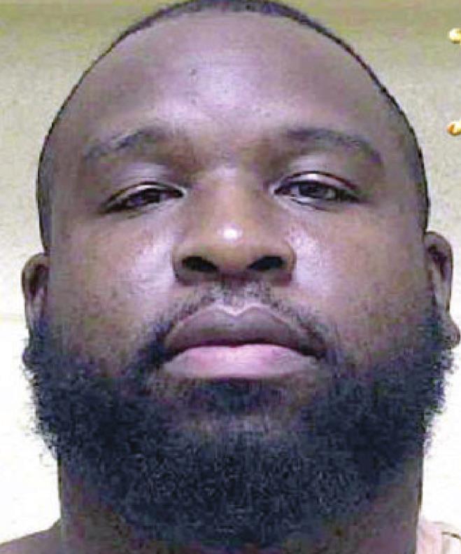 Man behind bars for possession of drugs, guns