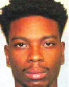 Traffic stop yields stolen gun, marijuana in vehicle