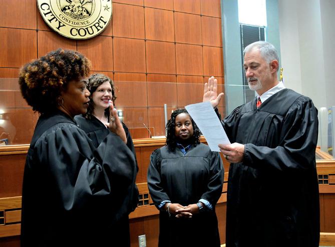 Judge Graham being sworn in.