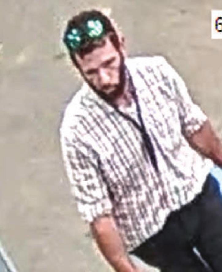 Police seek identities of two theft suspects