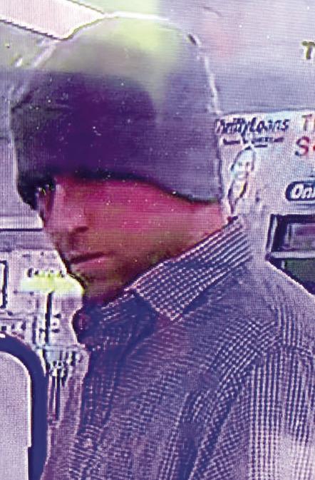 Police seek identity of debit card thief 