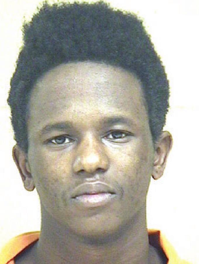 One arrested, another sought in homicide