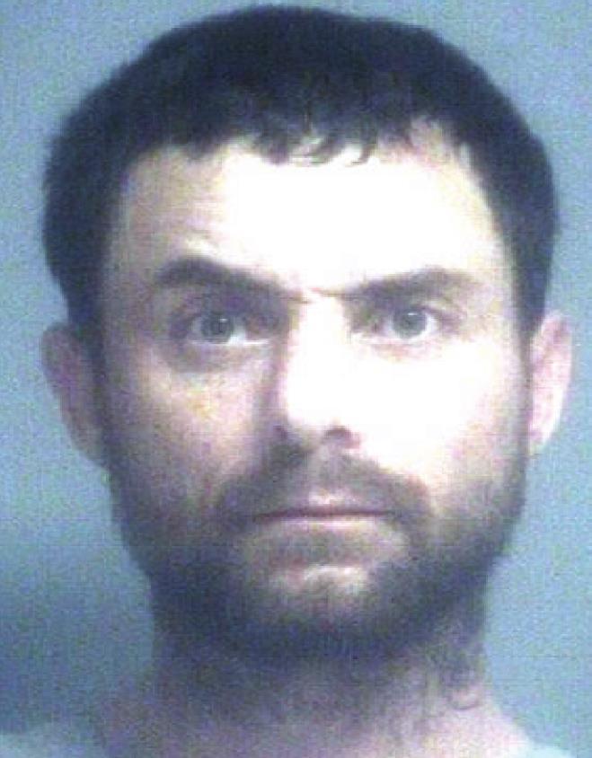 Man arrested after trying to discard drugs