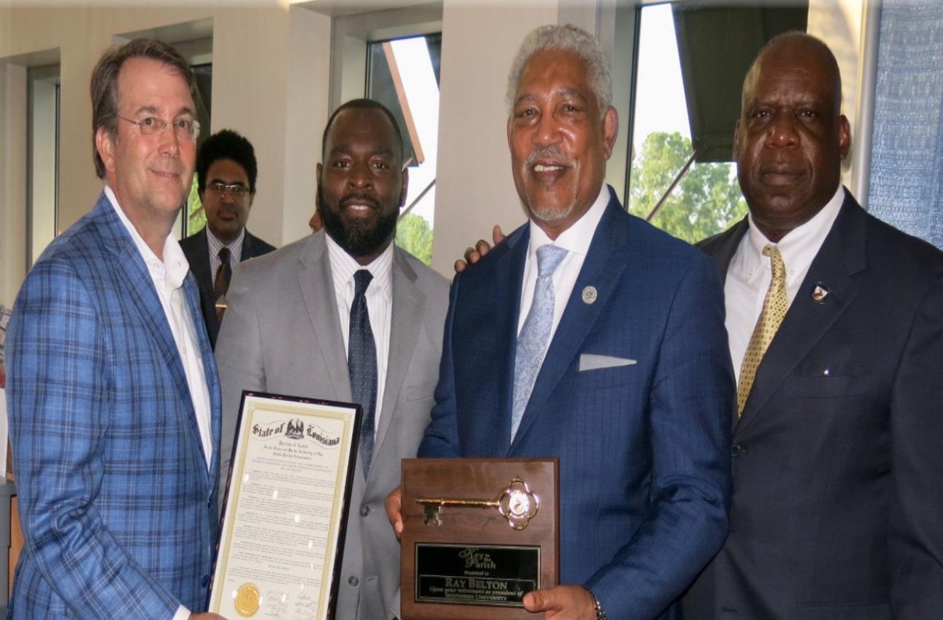 A GOURMET HOT DOG, PLEASE, FOR SOUTHERN UNIVERSITY SYSTEM PRESIDENT-CHANCELLOR RAY L. BELTON.