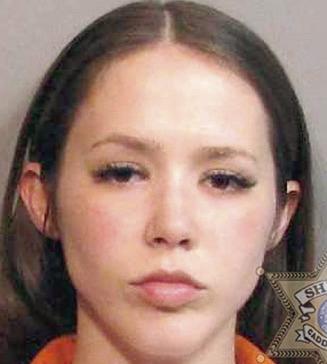 Woman arrested with a firearm