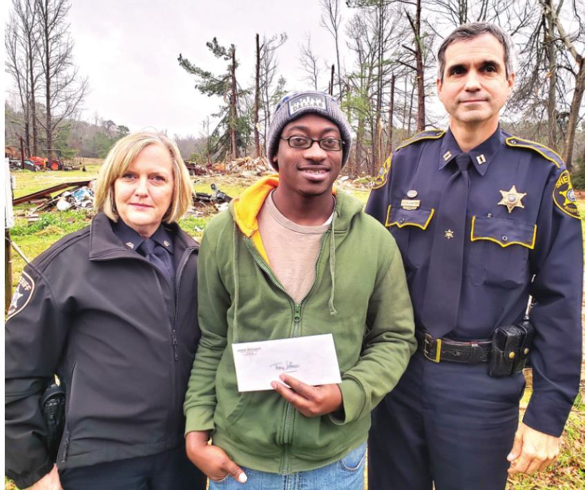 Bossier sheriff helps victim who lost relative in tornado