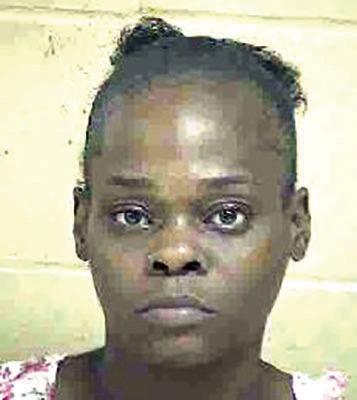 Woman arrested for assault with weapon while stealing
