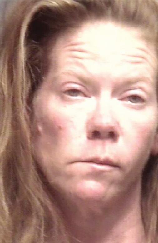 Woman rips signs at Bossier business