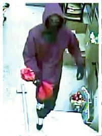 Police seek identity of robbery suspect