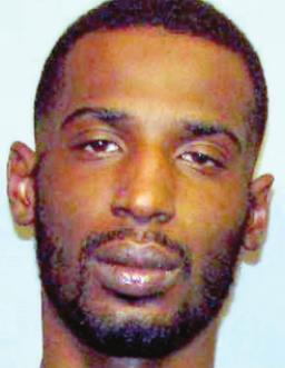 Suspect in May shooting surrenders to local police