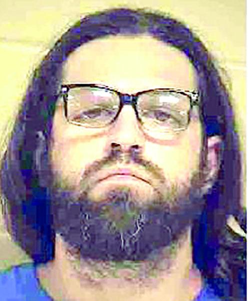 Two arrested following attack with hammer