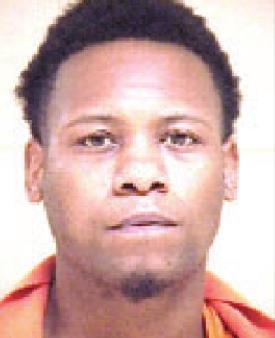 Two men found with marijuana, firearms