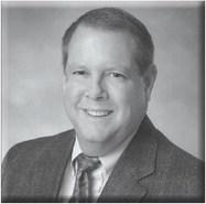Charles R. Henington Jr. gives Caddo Assessor