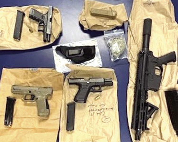 Four arrested for handling machine guns, possessing drugs